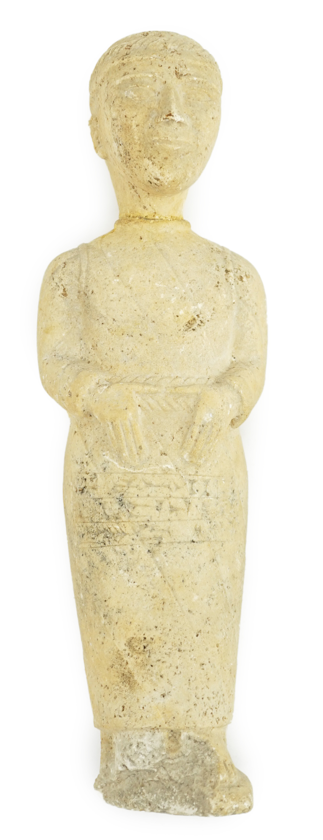 An unusual limestone votive figure, with cuneiform inscription, possibly Mesopotamian